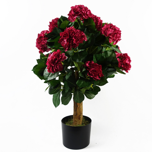 A view of the Plantish Artificial Hydrangea in Pink, showing the detailed silk flowers, dark green leaves, and real wood trunk against a white background.