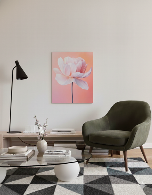 An abstract brightly coloured canvas of a single poppy viewed from the side in beautiful hues of pink, white, and orange, in a bright scandinavian living room.