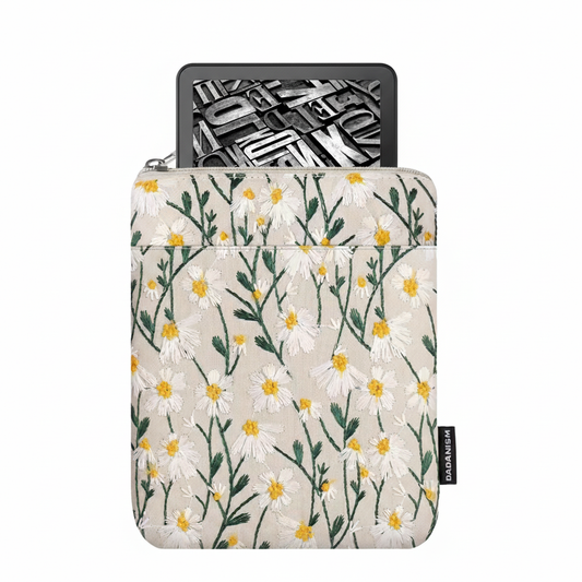 The Plantish Embroidered Little Daisy E-reader Case with a Kindle device inside on a white background