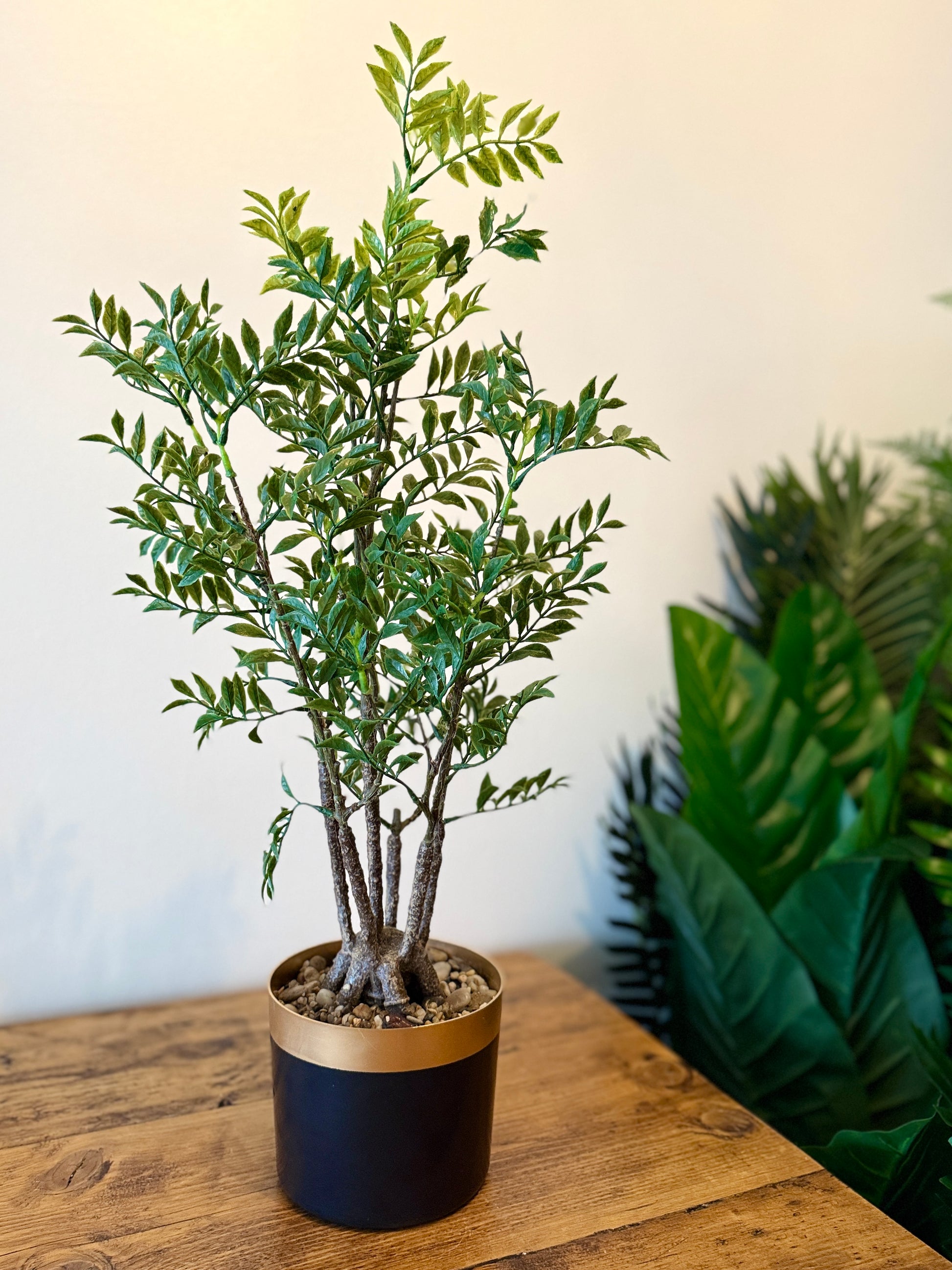 Front view of the Plantish artificial Nandina Ficus Bonsai, showcasing its full, realistic leaves and branches.