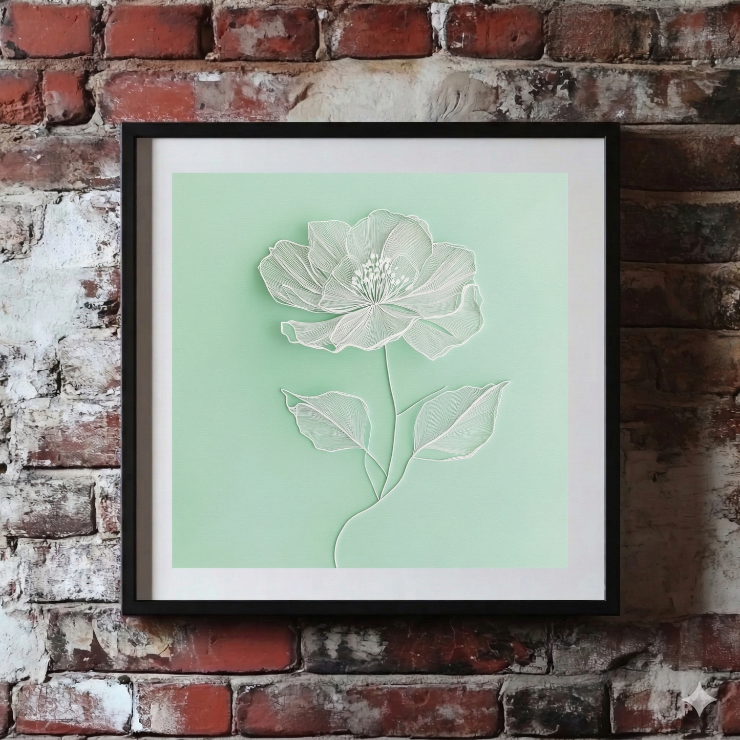 A bright Plantish print of a white line drawn poppy flower on a calming light green background, shown hanging on a red brick wall.
