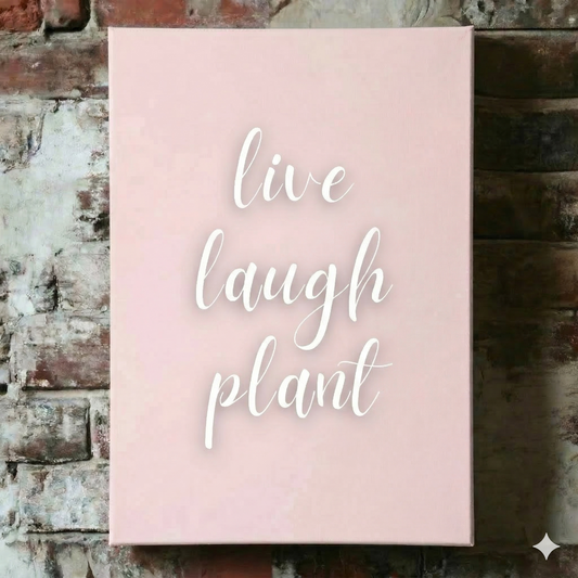 A Plantish canvas of the phrase "Live Laugh Plant" in a white script font on a pink background, mounted on a red brick wall.