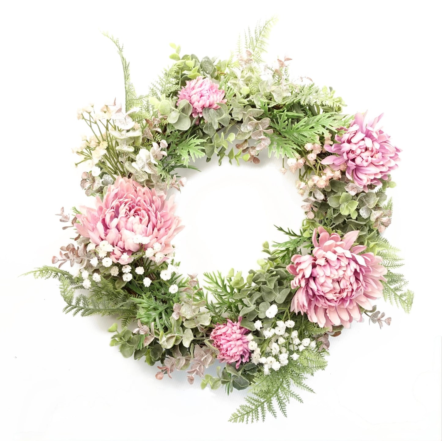 The Plantish 45cm Pink Peony Wreath shown front-on, highlighting the pink peonies, green leaves and fronds, and small white flowers. 
