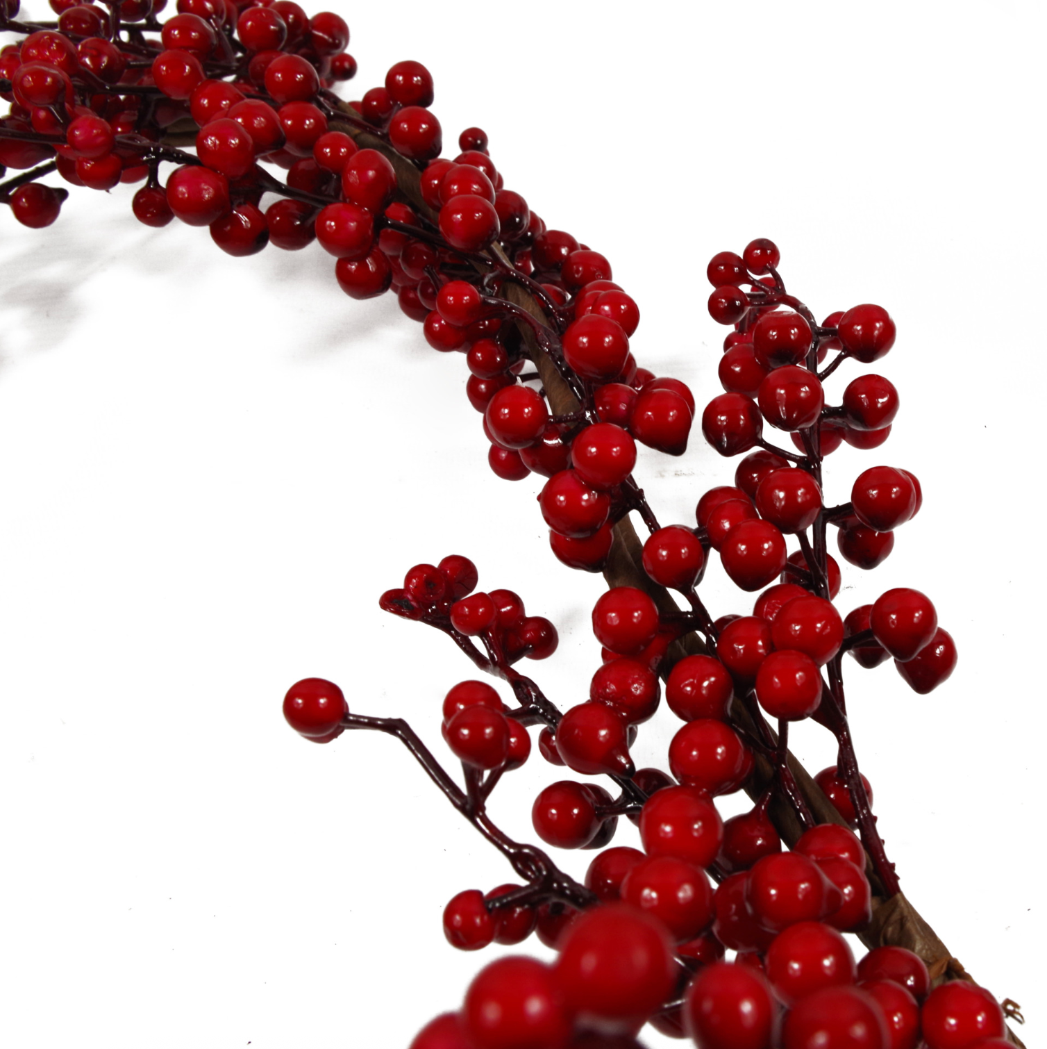 A close up of the Plantish Red Winter Berry Garland, showing the dark red berries and brown stem design in detail.  