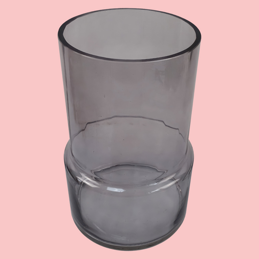 Top view of the Plantish Smoky Vase, made of smoked glass. Shown on a block pink background.