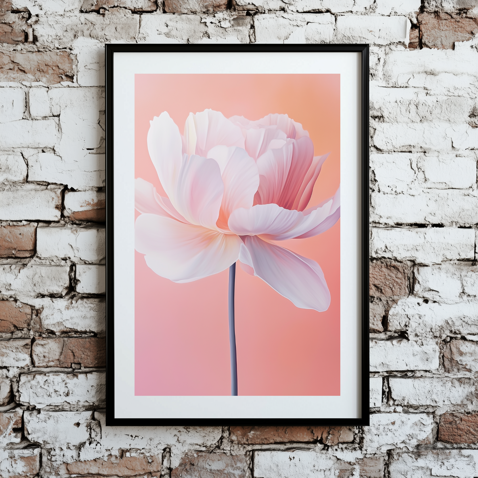 An abstract brightly coloured print of a single poppy viewed from the side in beautiful hues of pink, white, and orange, framed on a brick wall. 