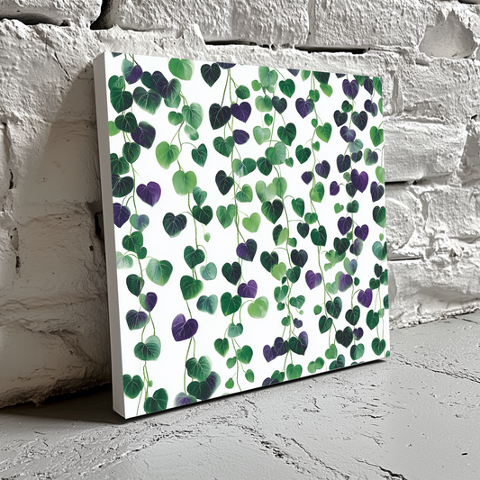 A bright and vibrant plant pattern canvas of a string of hearts in green and purple, resting on a white brick wall. 
