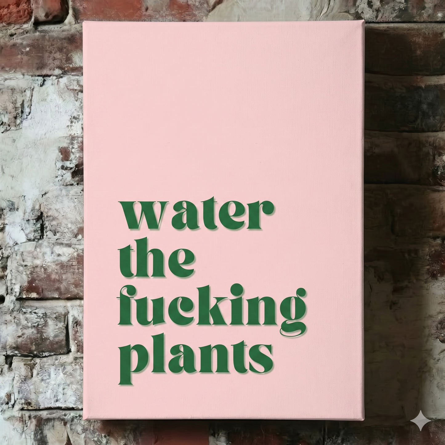 A Plantish canvas showing the phrase "Water the Fucking Plants" in a green font against a pink background, hanging on a red brick wall.
